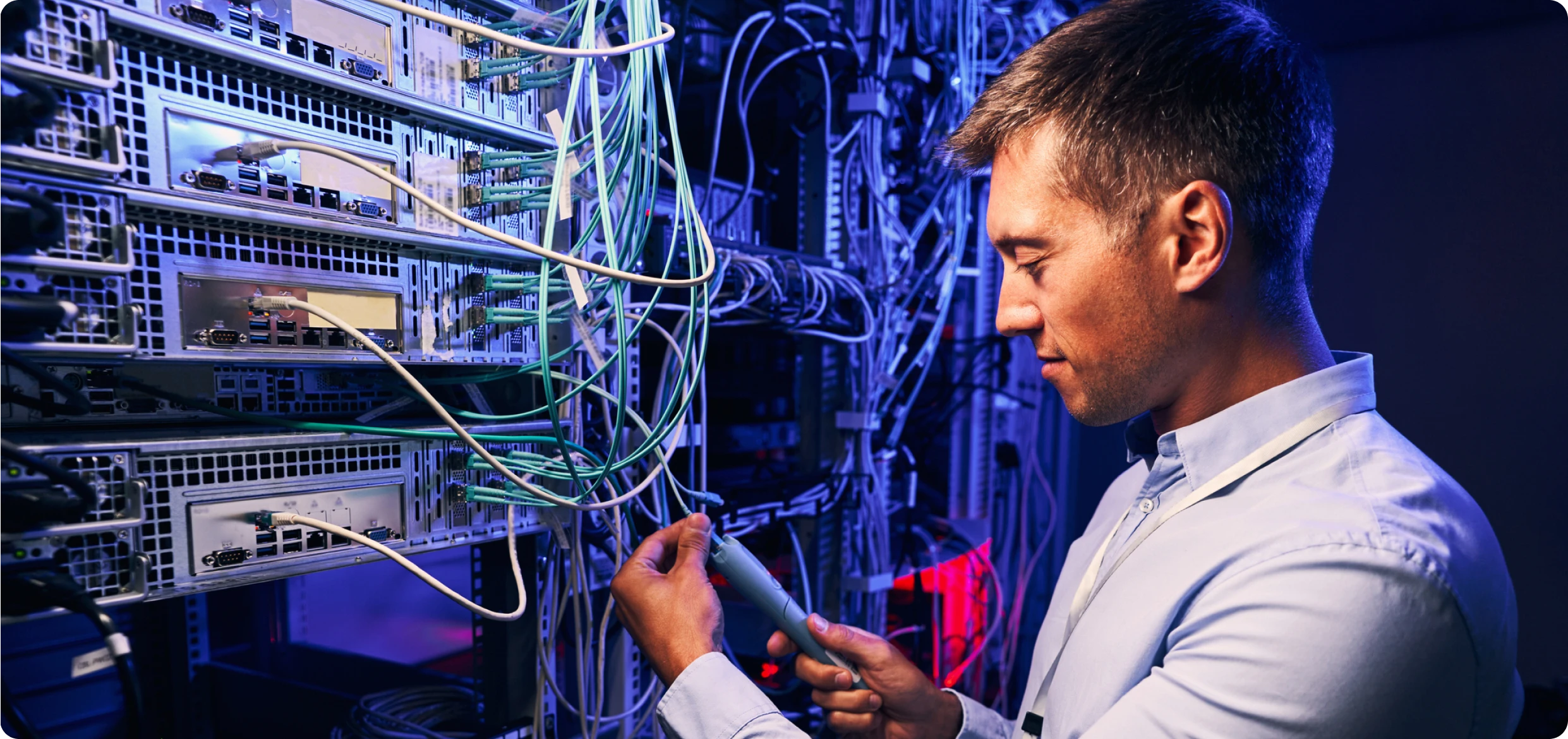 IT professional managing data center wires